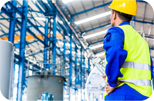 Manufacturing Employee looking a plant facility